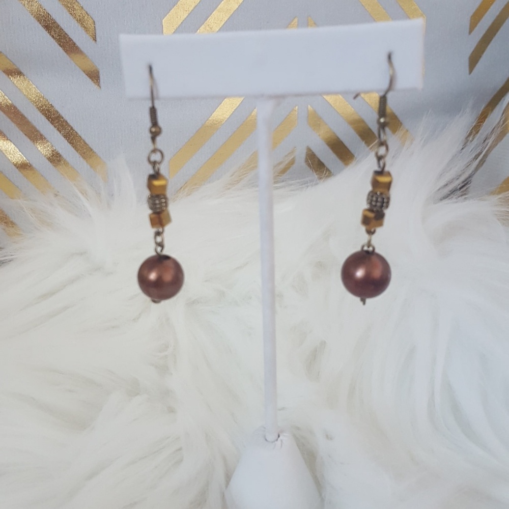 Brown beaded dangle earrings